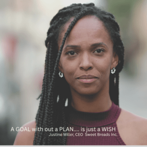 Quote by Justine Miller, CEO of Sweet Breads Inc., reading 'A goal without a plan… is just a wish,' displayed on a blurred background with a woman in a maroon top and braided hairstyle.